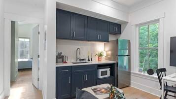 Fridge, microwave, cookware/dishes/utensils