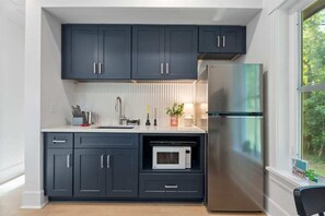 Fridge, microwave, cookware/dishes/utensils