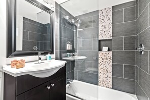 Shower, hair dryer, towels