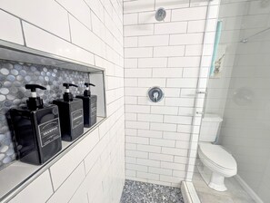 Shower, hair dryer, towels, soap