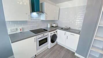 Refrigerador, microondas, horno, placa de cocina