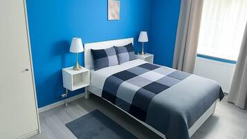 2 habitaciones, tabla de planchar con plancha, cuna de viaje y wifi