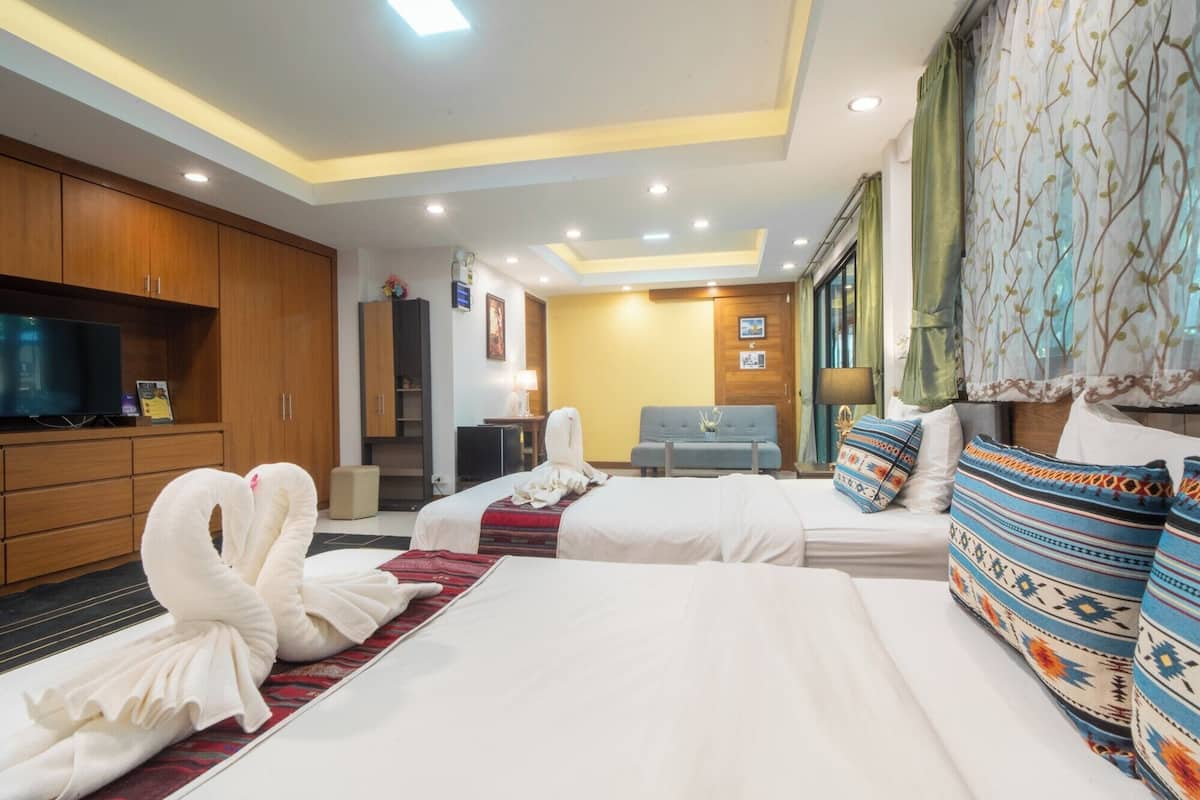 Family Triple Room, Multiple Beds, Private Bathroom, Garden View | Desk, laptop workspace, free WiFi, bed sheets