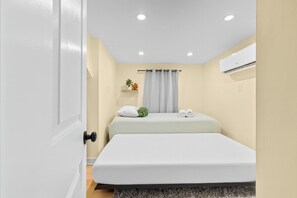 2 bedrooms, desk, iron/ironing board, travel cot