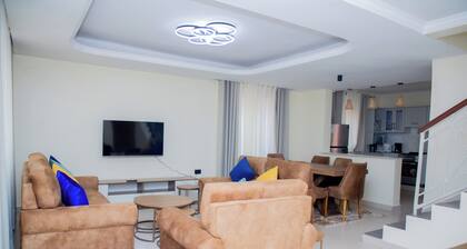 4-bedroom estate in welcoming Kigali-Rwanda with WiFi in a family-friendly area.