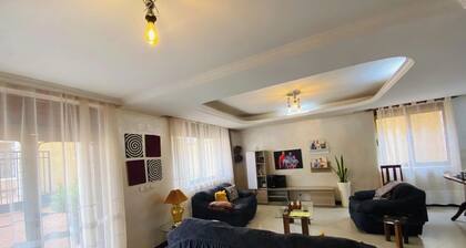 4-bedroom estate in welcoming Kigali-Rwanda with WiFi in a family-friendly area.
