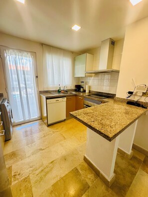 Microwave, oven, stovetop, coffee/tea maker