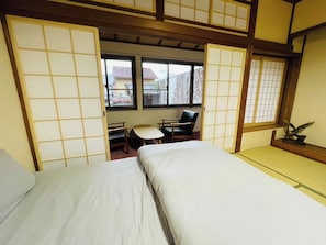 Desk, free WiFi, bed sheets
