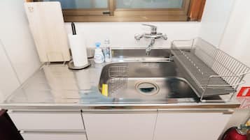 Fridge, microwave, stovetop, cookware/dishes/utensils