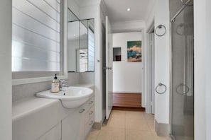 Hair dryer, towels, shampoo, toilet paper