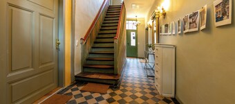 Spend the night in a monument with a view of the trees in the middle of the old town