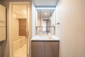 Apartment, 2 Bedrooms (701) | Bathroom | Combined shower/tub, free toiletries, hair dryer, slippers - STARRY STAY SUITE IMPROVE NISHIMAGOME (Tokyo)