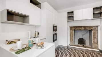 Standard-Apartment, 1 Schlafzimmer (Deluxe Flat Lugano) | Eigene Küche | Kühlschrank, Mikrowelle, Ofen, Herdplatte
