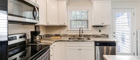 Fridge, microwave, dishwasher, coffee/tea maker