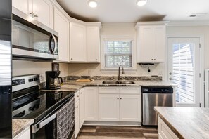 Fridge, microwave, dishwasher, coffee/tea maker