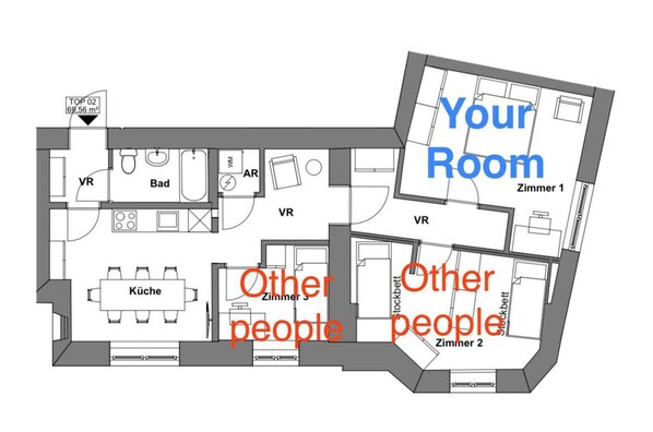 A floor plan of a hotel with labeled rooms, including a kitchen, a bathroom, and two other rooms.