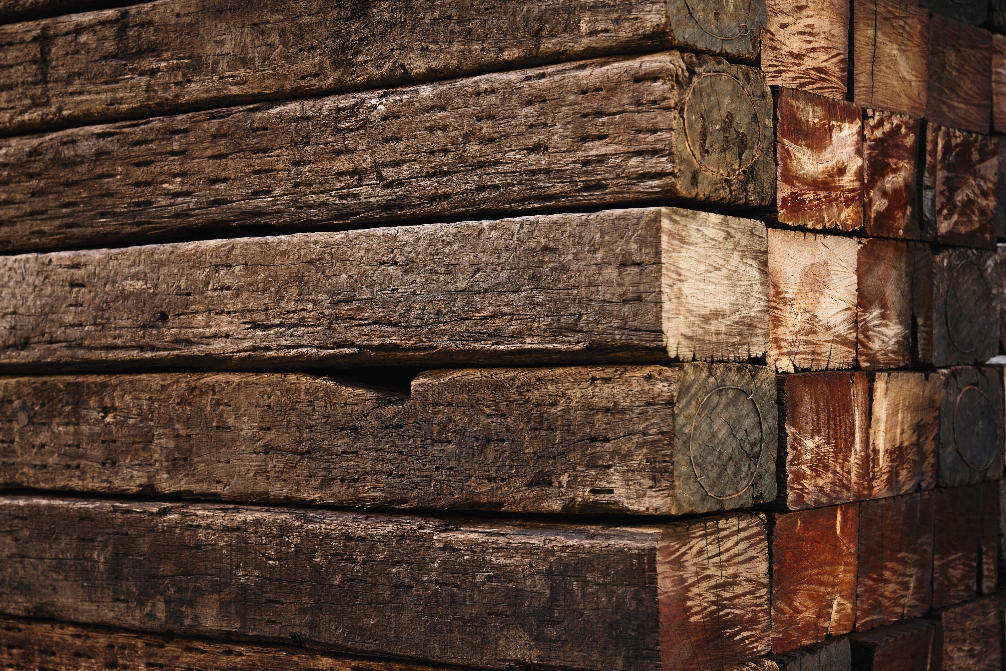 A stack of wooden logs.