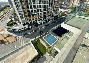 Apartamento família, 3 quartos, sacada, vista para a piscina | Vista da sacada