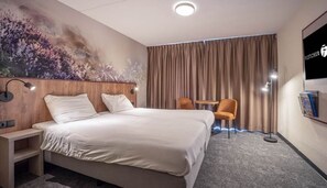 1 slaapkamer, een strijkplank/strijkijzer, gratis wifi, beddengoed