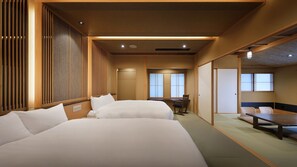 Suite Deluxe | Edredón, wifi gratis y ropa de cama