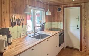 Fridge, stovetop, dishwasher, coffee/tea maker