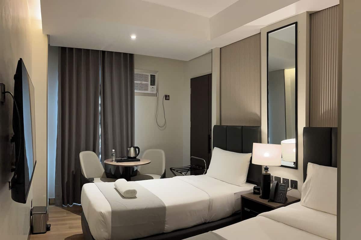 Habitació amb dos llits individuals Deluxe | Wifi gratuïta i roba de llit