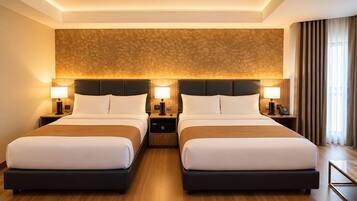 A double room with two beds, bedside tables, lamps, and a patterned wall.
