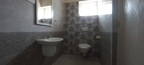 Deluxe Triple Room, Multiple Beds | Bathroom | Shower, towels, soap, shampoo - Shantham Service Apartments Indumanagar (Coimbatore)