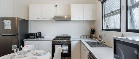 Fridge, microwave, oven, stovetop