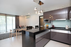 Family Apartment, 2 Bedrooms, Balcony, Garden View | Private kitchen | Electric kettle