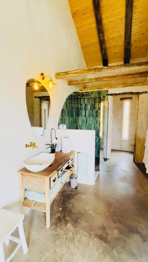 Eco-friendly toiletries, hair dryer, towels, soap