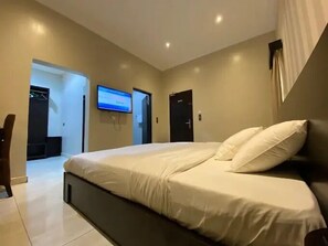 Family Room, Balcony, City View | Desk, laptop workspace, blackout curtains, soundproofing - Exclusive No8 Boutique Hotel (Ilorin)