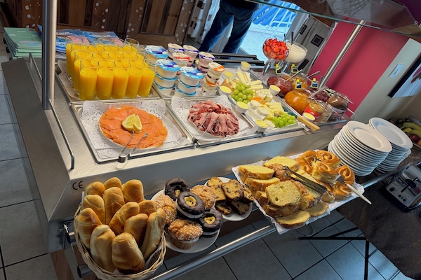 Daily buffet breakfast (EUR 14 per person)