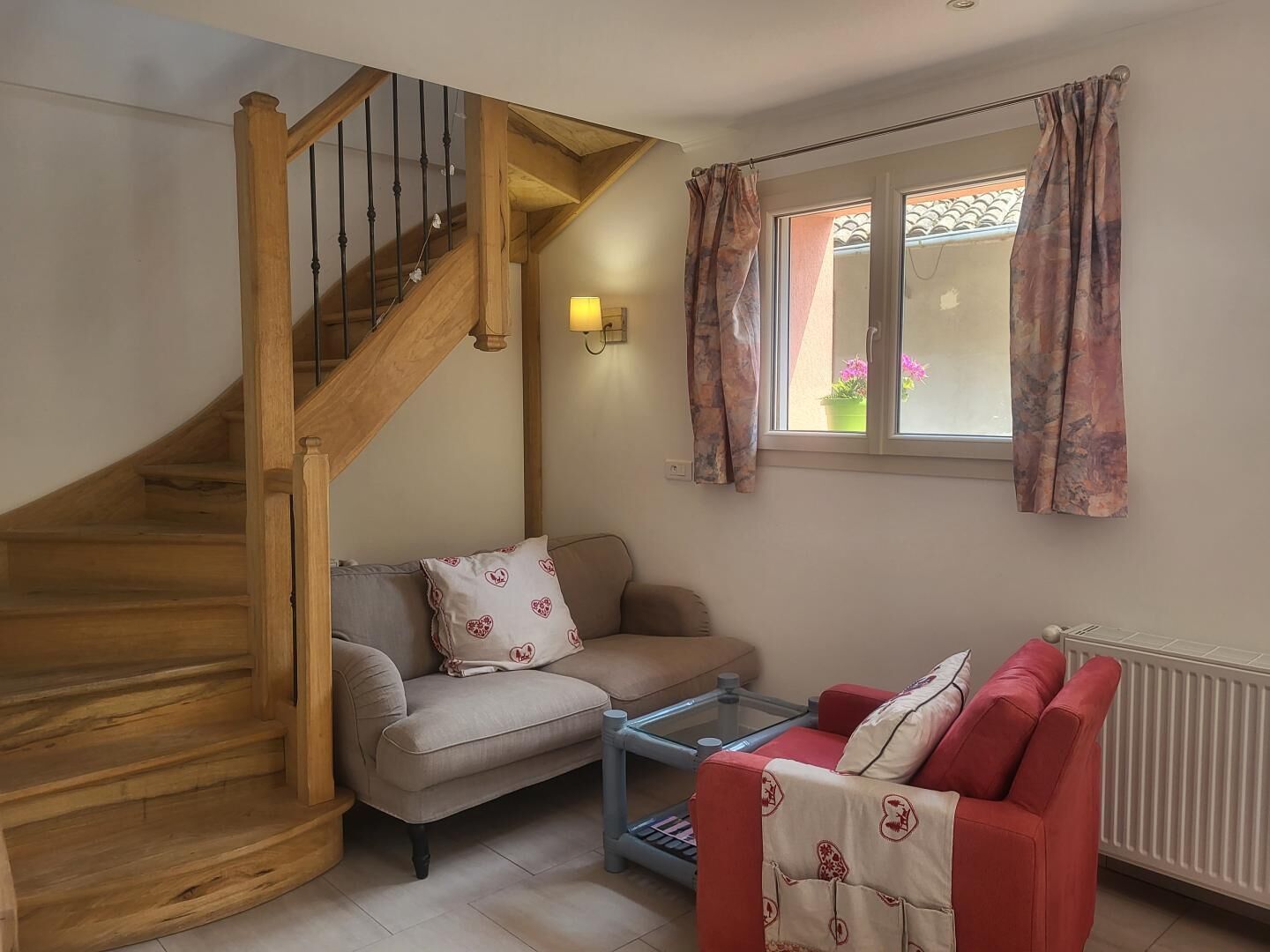 A staircase with wooden railings leading to an upper floor.