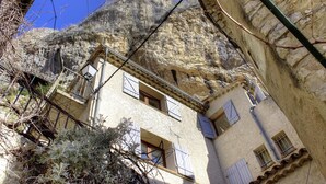 A traditional stone building with multiple windows and a rustic exterior. - Le Baousset - SIGALE (SIGALE)