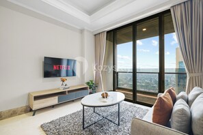 アパートメント 1 ベッドルーム バルコニー シティビュー | リビング エリア | 薄型テレビ