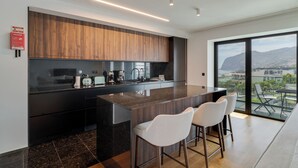 Fridge, microwave, oven, stovetop - Oceanview Pearl Apartment (Funchal)