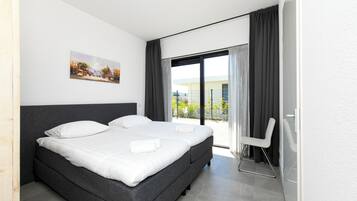 4 habitaciones, tabla de planchar con plancha, cuna de viaje y wifi