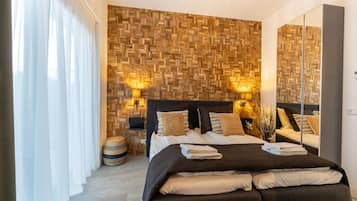 4 habitaciones, tabla de planchar con plancha, cuna de viaje y wifi