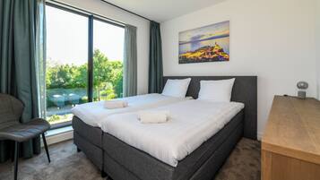 5 habitaciones, tabla de planchar con plancha, cuna de viaje y wifi