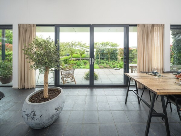 Dining - 4-person villa with green garden, private jetty, 2 bathrooms, hammock, canoe and sunny terrace. Located at Villa Resort Harderwold between forest and water! (Zeewolde)