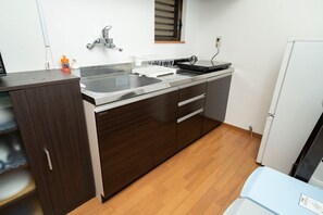 Fridge, microwave, cookware/dishes/utensils