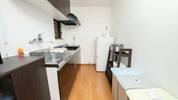 Fridge, microwave, cookware/dishes/utensils