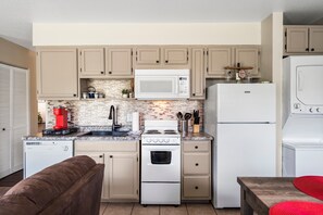 Condo, 1 Queen Bed with Sofa bed, Patio, Golf View (Cozy Escape) | Private kitchen | Fridge, microwave, oven, stovetop