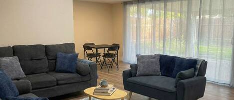 TV, fireplace, books, offices