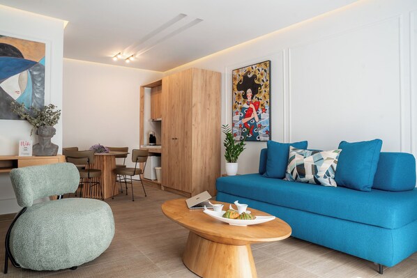 Grand Suite, Balcony, City View | Living area | 45-inch flat-screen TV with cable channels, Netflix, streaming services