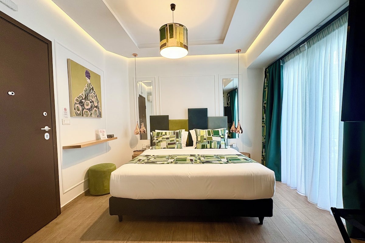 Suíte júnior, vista para a cidade | Roupas de cama premium, edredons de pluma