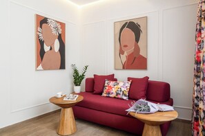 Family Suite, City View | Living area | 45-inch flat-screen TV with cable channels, Netflix, streaming services - Garment District Suites (Athens)