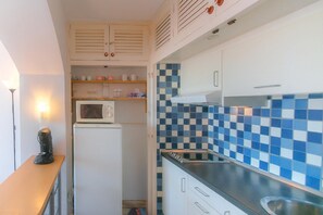 Fridge, microwave, coffee/tea maker, toaster