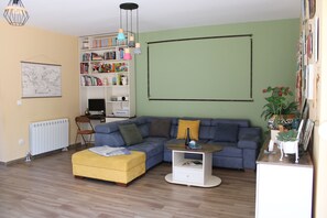 Fireplace, books, computer monitors, printers